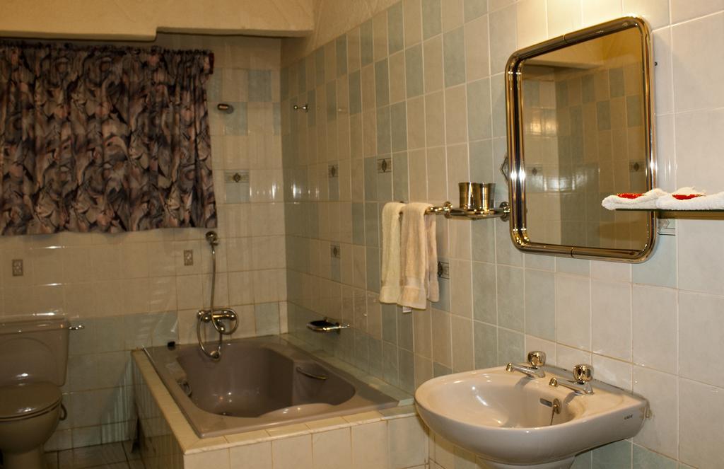 Four Villages Inn Kumasi Rom bilde